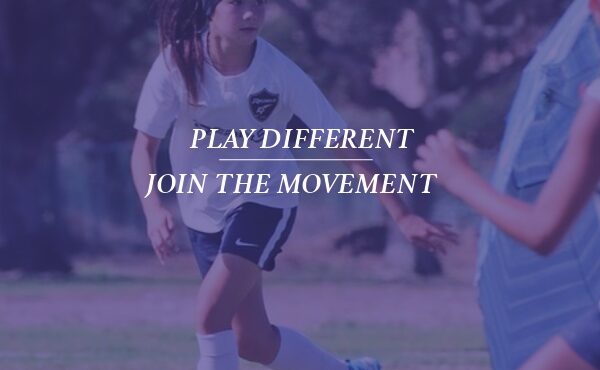 Rebels SC girl playing soccer.